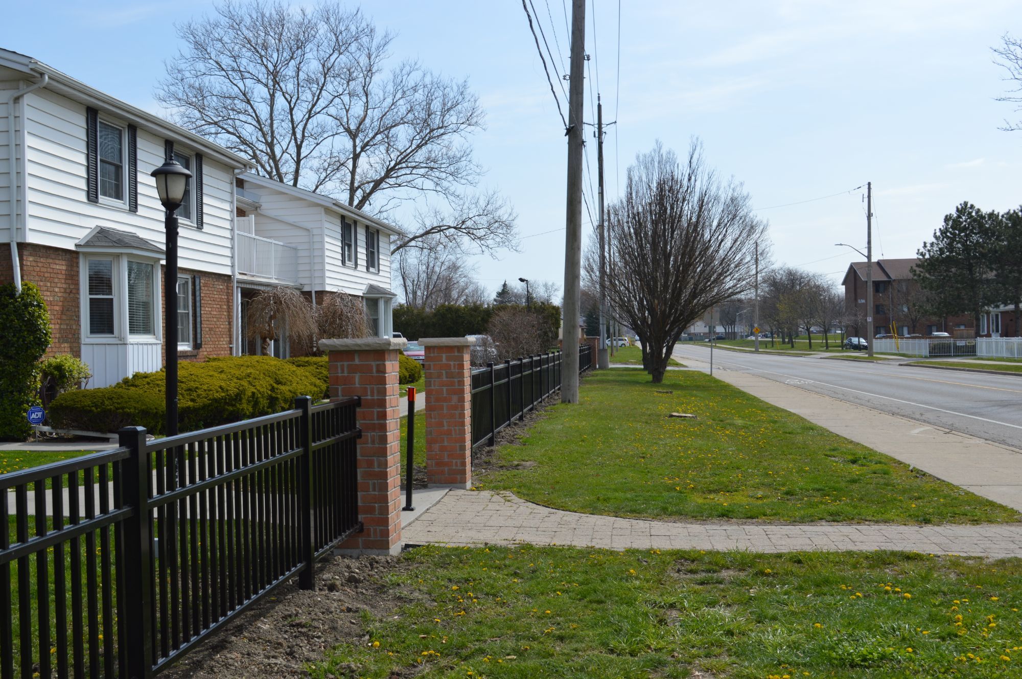 Bringing up the neighborhood along Little River Boulevard in Windsor, we installed this fence during the beginning of the COVID-19 pandemic. With the brick column pillars it makes a stylist statement about the class of the condominium development.