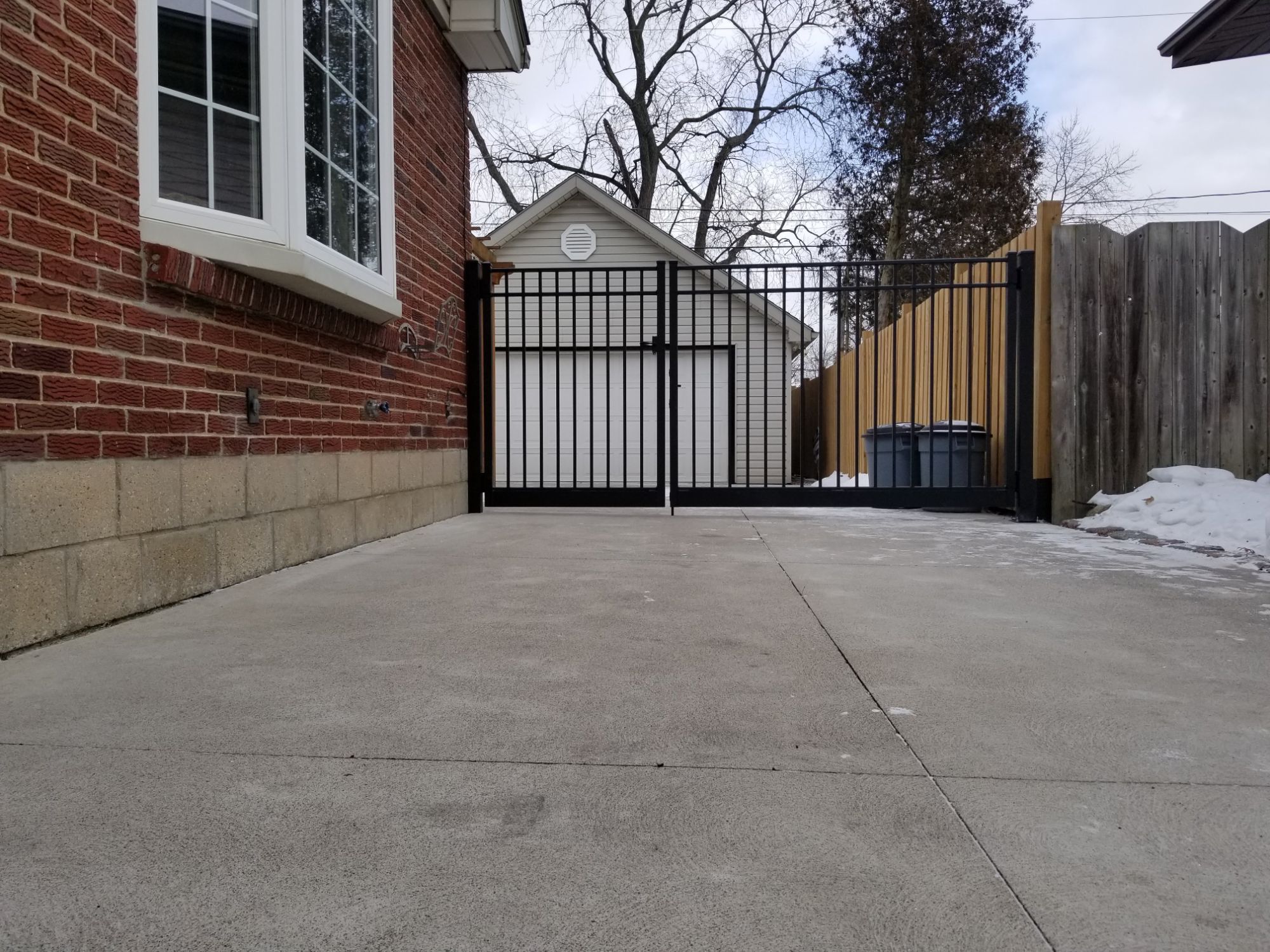 Set of double gates we installed for a customer is south Windsor. These are custom built to maximize the driveway area and entirely made from Aluminum.